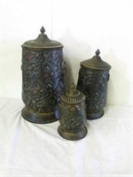 3 metal decorative lidded tins. Tallest is 18"