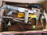 caulk gun and tools