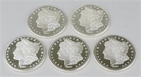 5 One Troy Ounce Fine Silver Morgan Coins.