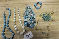 LARGE LOT OF TURQOUISE TONED NECKLACES AND BRACLES
