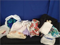 Box of Fabric and Sleeping Bag