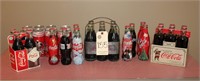 Collectible Coca-Cola bottles and cans