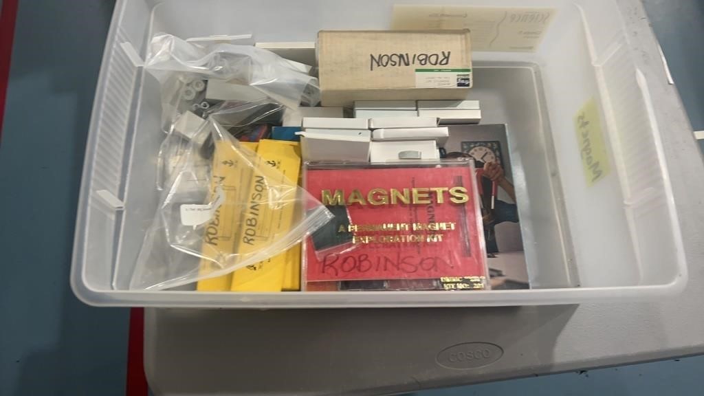 Plastic tub with contents (miscellaneous magnets)