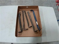 assortment of pry bars, nail pullers