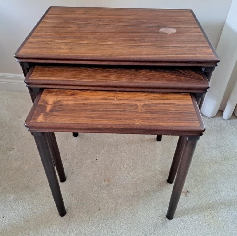 Set of 3 teak nesting tables.