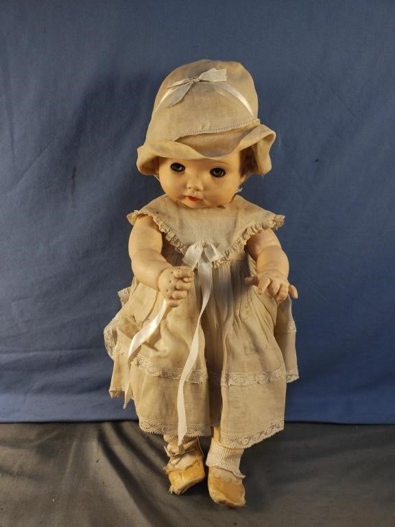 Vintage plastic baby doll with closeable eyes and