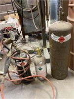 Three Welding Gas Tanks and Cutting Torch