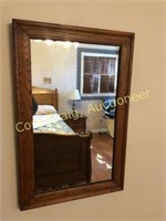 Wall mirror in oak frame