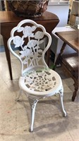 White cast metal patio chair, seat height 16