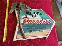 welcome to paradise sign where it's always happy h