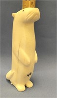 A large 6" core ivory carved sea otter with inset