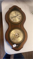 Bulova wall clock with a barometer