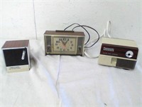 Vintage items. Clock, sharpener, and weather