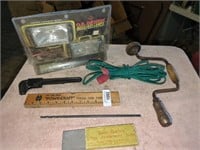 Vintage pipe wrench, handheld hole drill,