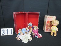 Red case of vintage dolls & Baby Tender Love doll