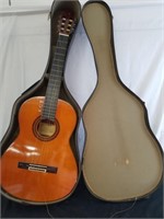Yamaha acoustic guitar inside case