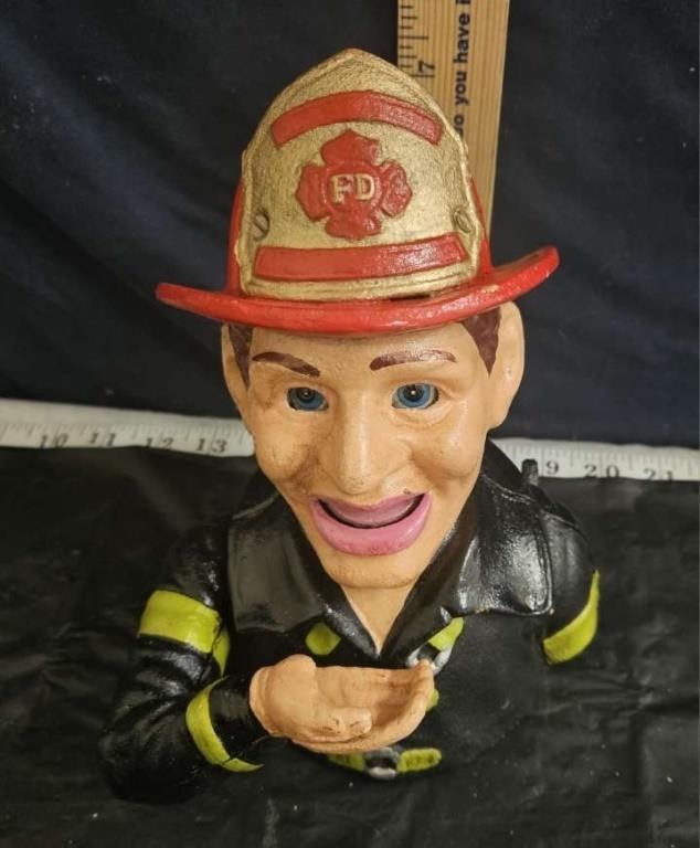 cast iron fireman mechanical bank