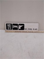 Wood eat sleep hunt sign