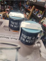 2 coffee mugs with coasters