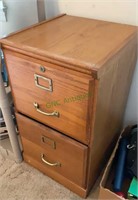 Vintage laminated wood two drawer file cabinet.