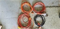 3 extension cords and a trouble light