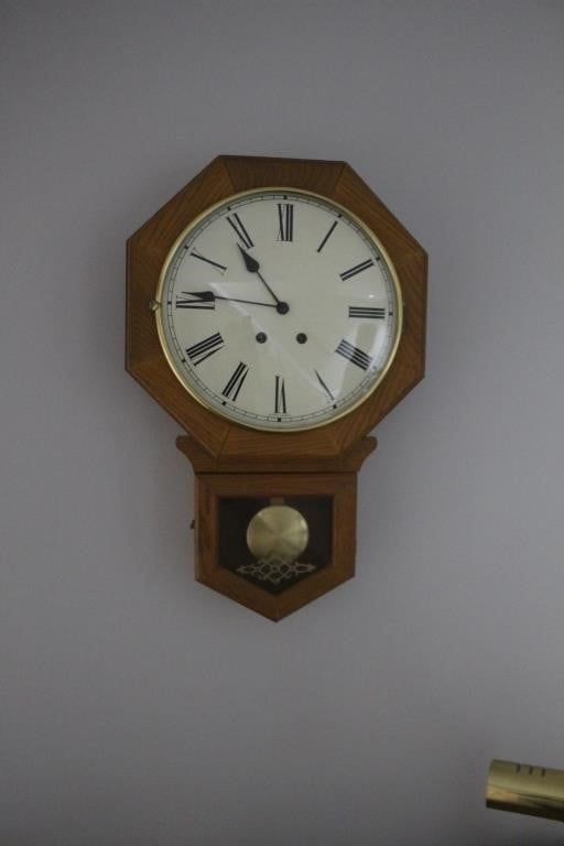 Hand crafted key wound wall clock with key