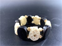 Mammoth ivory and baleen stretch bracelet, with go