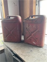 Red metal gasoline cans