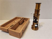 Brass Field microscope with box.
