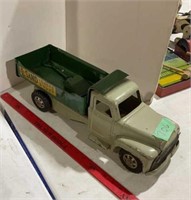 Vintage dump truck with shovel