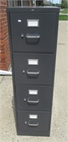 4 Drawer file cabinet. Measures: 52" H x 15" W x