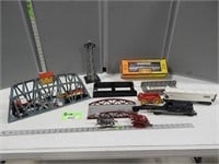 Model train cars and accessories and some horses
