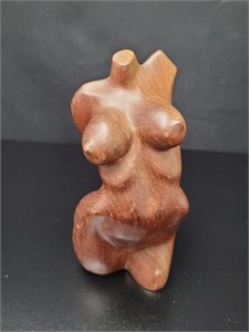 carved female nude torso sculpture