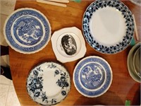 lot of decorative plates , bowls  , some made in