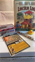 Lincoln Logs set, Snickers Racing Team tin, ruler