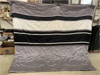Gray, Black, and White Comforter and Bed Skirt