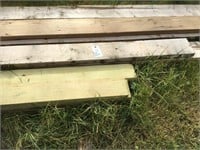 Pile of used dimension lumber, 2"x6"s, 2"x8"s,