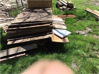 Pile of used plywood sheeting/paneling.