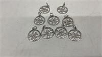 (9) 1989 Lake Tahoe charms, Sterling toned