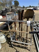 138) Metal rack w/shovel, post hole diggers,