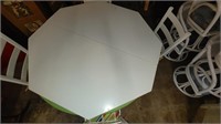 white tables & 4 chairs w/ 2 extra table tops