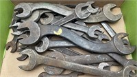 Small box of antique wrenches
