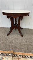 Victorian walnut table with marble top by J.S.