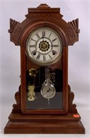 Waterbury mantle clock, walnut case, has alarm,