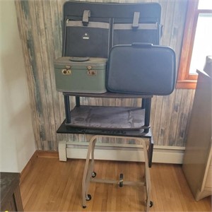Suitcases, end table, typewriter table