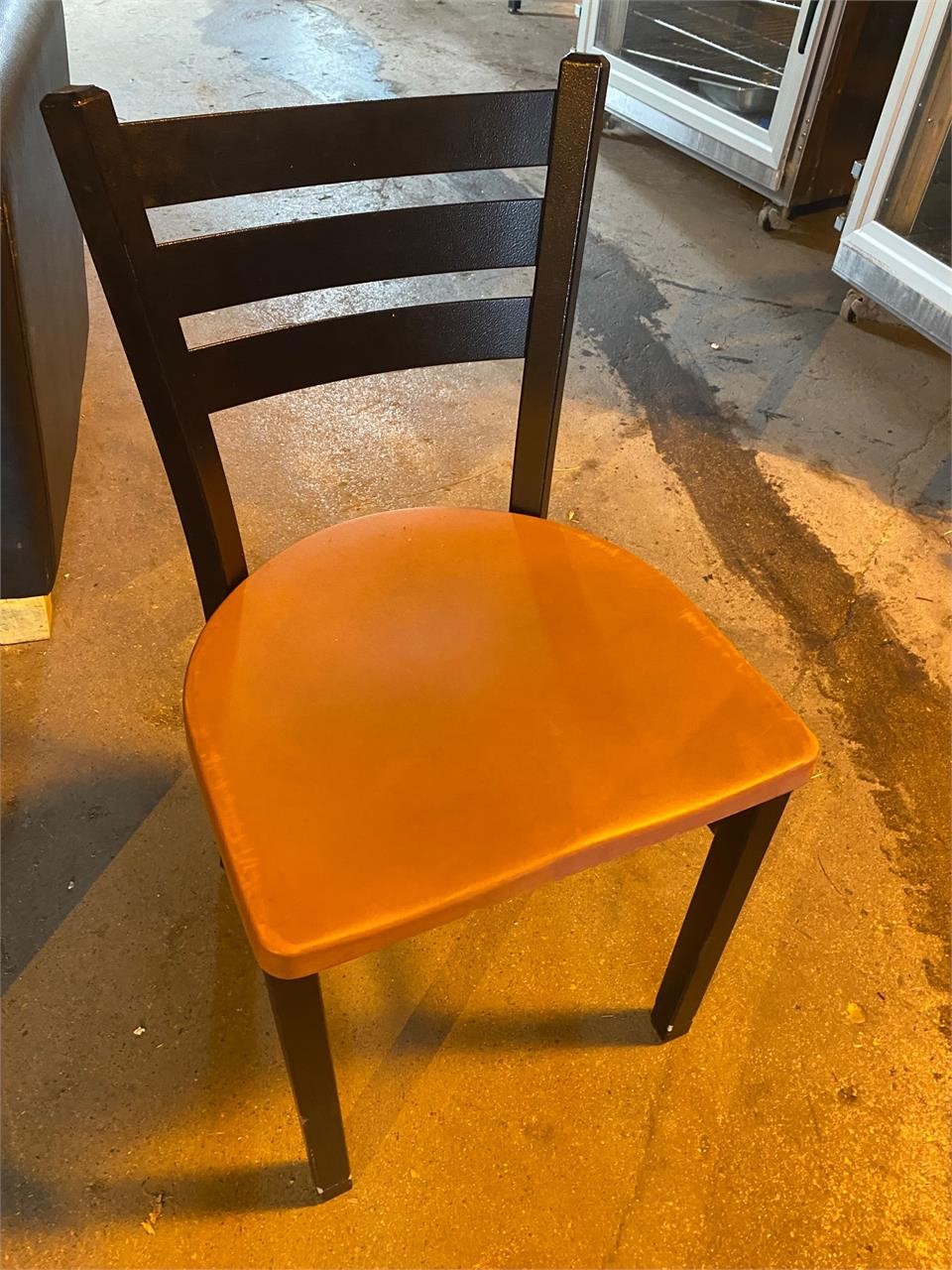 8 pale red plastic seat chairs steel frame