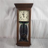 Oak cabinet pendulum wall clock