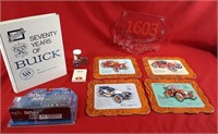Book Seventy Years of Buick, car toys, rulers,