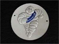 MICHELIN MAN EMBOSSED CAST IRON WALL PLAQUE