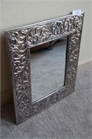 metal framed wall mirror